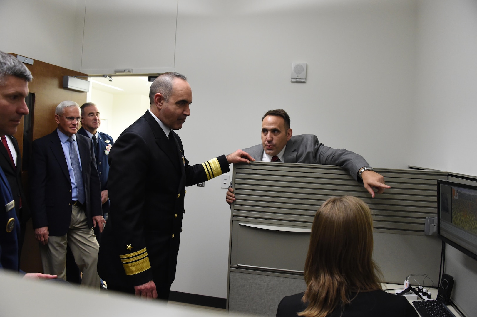 Dr. Douglas Derrick (right), assistant professor of the University of Nebraska at Omaha (UNO) Information and Technology Innovation School of Interdisciplinary Informatics, explains how UNO’s Jack and Stephanie Koraleski Commerce and Applied Behavioral Laboratory equipment works to U.S. Navy Vice Adm. Charles “Chas” A. Richard (center), deputy commander of U.S. Strategic Command, Jan. 20, 2017. Richard and other senior leaders toured UNO’s Mammel Hall as part of the 2017 USSTRATCOM Leadership Fellows Program kickoff. One of nine DoD unified combatant commands, USSTRATCOM has global strategic missions assigned through the Unified Command Plan that include strategic deterrence; space operations; cyberspace operations; joint electronic warfare; global strike; missile defense; intelligence, surveillance and reconnaissance; and analysis and targeting.