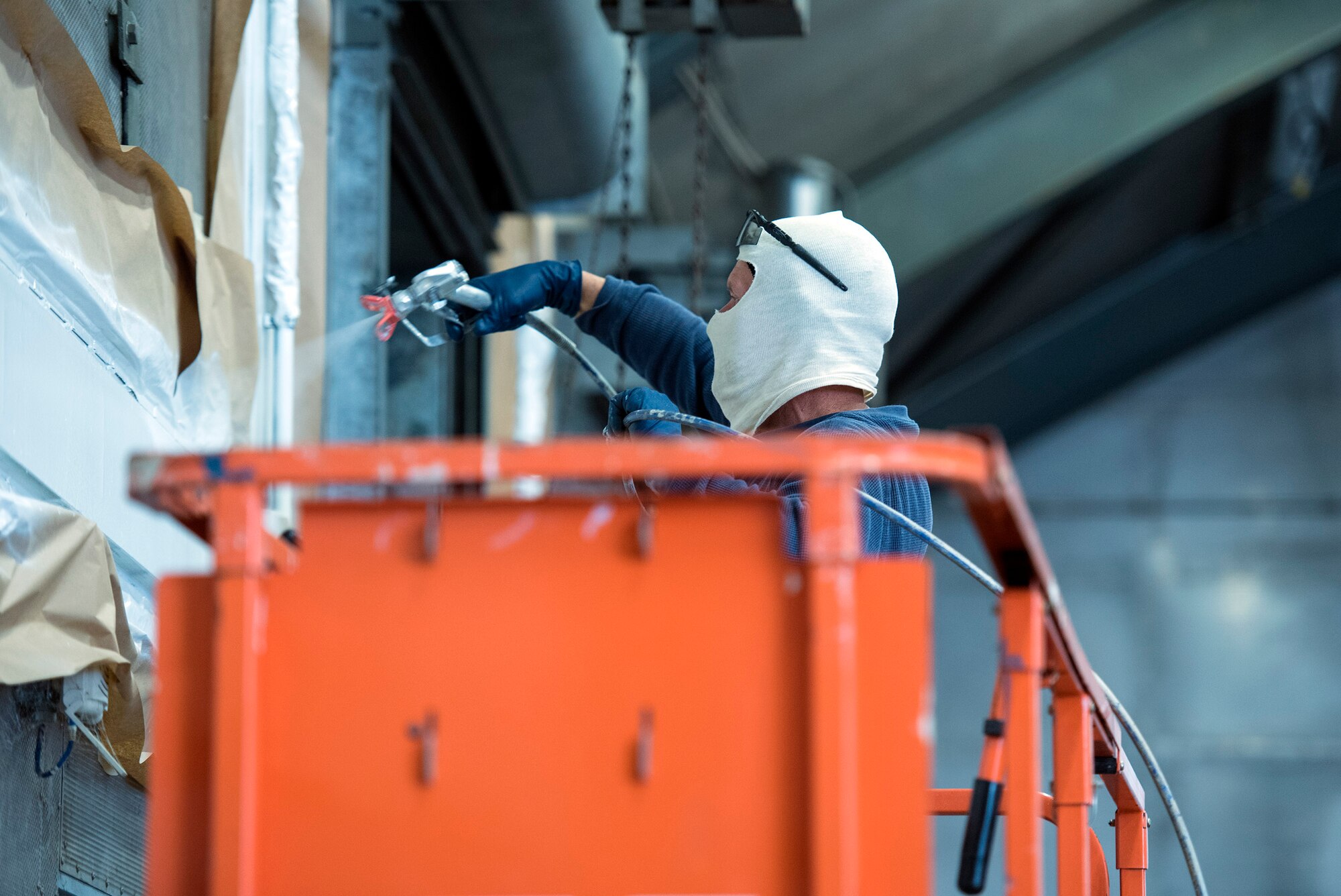 Hans Otte, local civilian contractor, paints inside the under construction “Hush House 2” test cell facility, Jan. 23, 2017, at Moody Air Force Base, Ga. A team of civilian contractors have performed upgrades while providing the 23d Component Maintenance Squadron test cell team ongoing support for the test cell facilities by contributing analysis of failures, component redundancy and upgrades for its operational capability requirements. (U.S. Air Force photo by Airman 1st Class Greg Nash)   