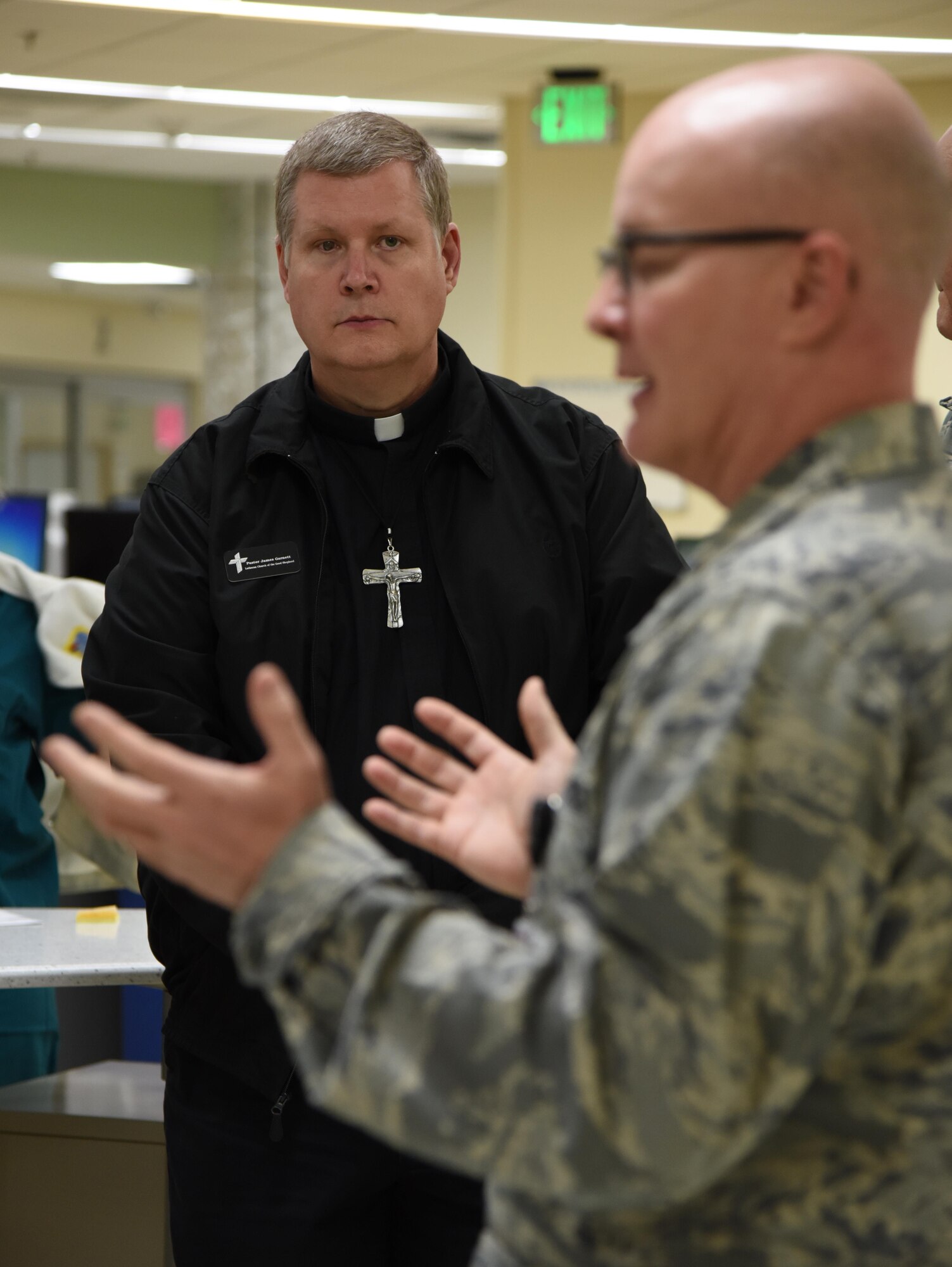 Pastor James Garnett, Lutheran Church of the Good Sheppard, listens to a Keesler Medical Center intensive care unit tour briefing during a Clergy Day event Jan. 26, 2017, on Keesler Air Force Base, Miss. Local religious organizations visited Keesler to build a stronger relationship with members of the 81st Training Wing Chapel. The event also included lunch and a tour of the Fishbowl inside the Levitow Training Support Facility. (U.S. Air Force photo by Kemberly Groue)