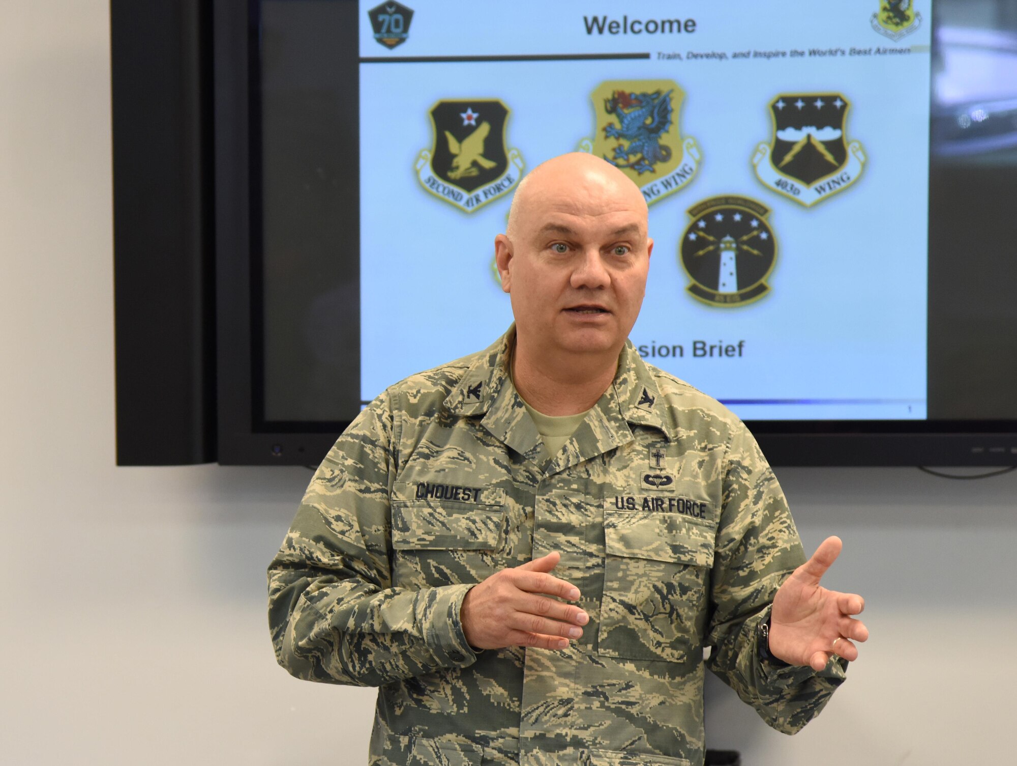 Chaplain (Col.) Alan Chouest, 81st Training Wing chaplain, welcomes guests to the Larcher Chapel during a Clergy Day event Jan. 26, 2017, on Keesler Air Force Base, Miss. Local religious organizations visited Keesler to build a stronger relationship with members of the 81st TRW Chapel. The event included lunch, a tour of the Fishbowl inside of the Levitow Training Support Facility and the Keesler Medical Center. (U.S. Air Force photo by Kemberly Groue)