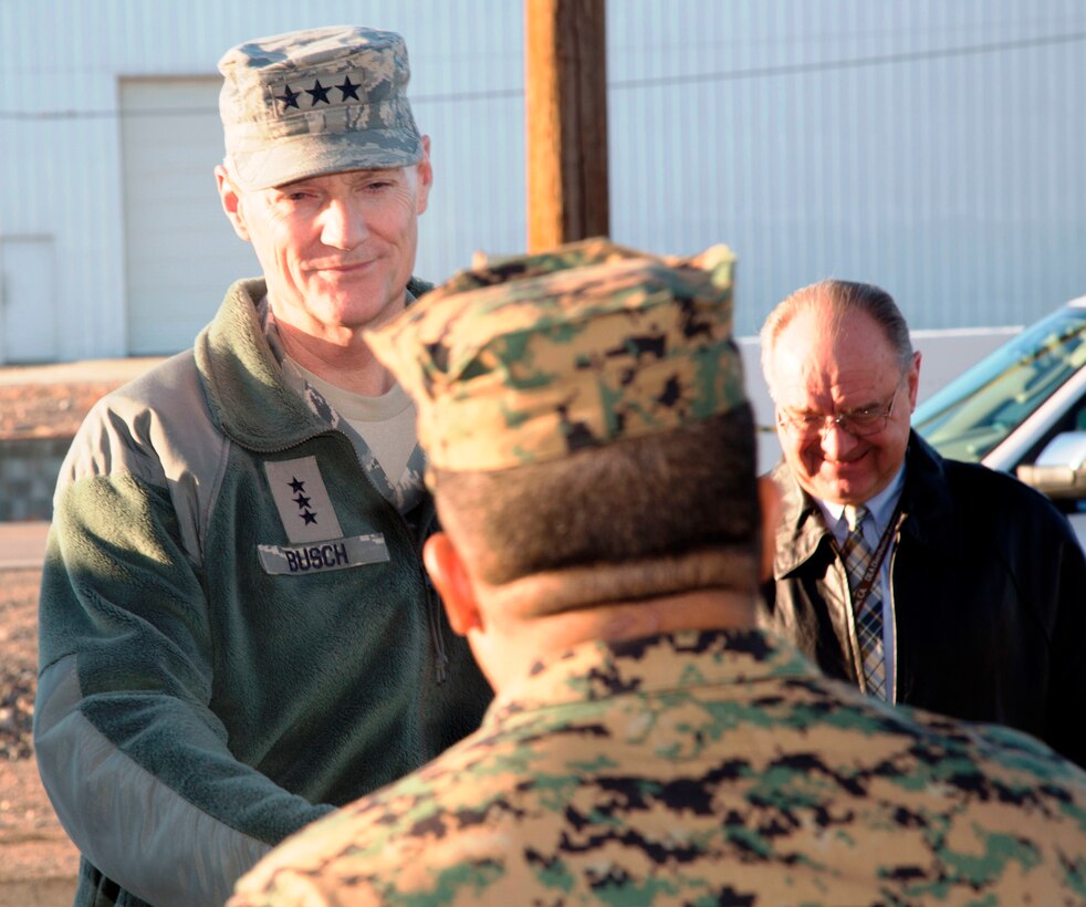 Air Force Lieutenant General Andrew W. Busch, director of Defense Logistics Agency, Ft. Belvior, Va., is greeted by Colonel Sekou S. Karega, Commanding Officer of MCLB Barstow, upon his arrival, Jan 26. The general took a tour of the installation visiting DLA assets and facilities.