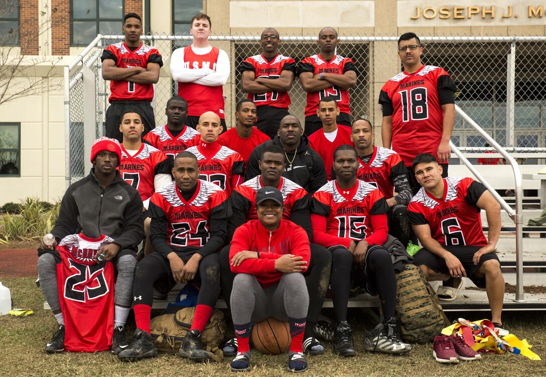 Team Goons, a team built from multiple departments at Marine Forces Reserve, pose for a photo after winning the Marine Corps Support Facility New Orleans Super Bowl tournament, Jan. 27, 2017. The tournament was held to build camaraderie, unit cohesion and esprit de corps between all departments within MARFORRES Headquarters. (U.S. Marine Corps photo by Lance Cpl. Dallas Johnson/Released)