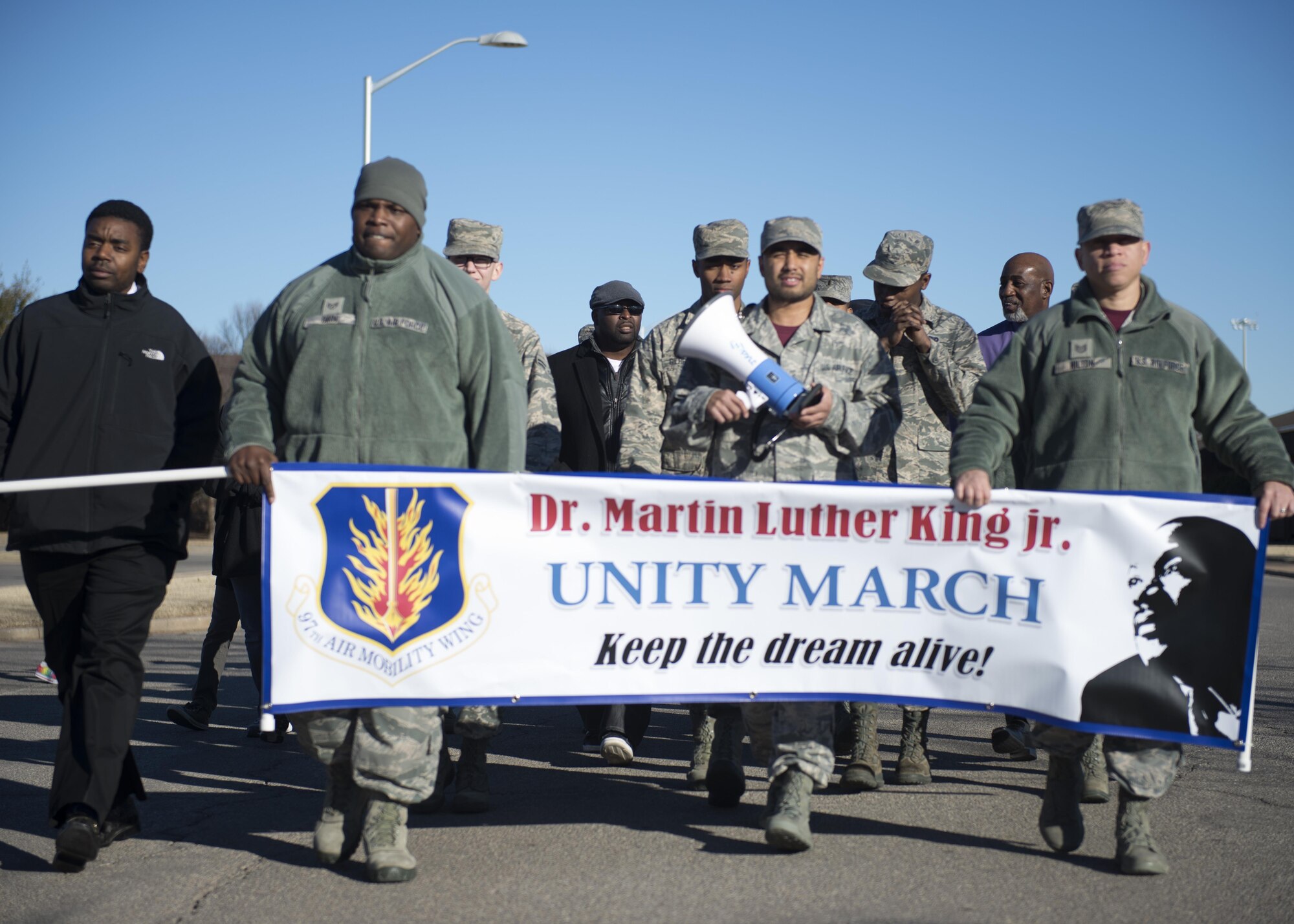 U.S. Air Force Airmen march together during a unity march, Jan. 27, 2017, at Altus Air Force Base, Oklahoma. The unity march was held to help remember the efforts of Dr. Martin Luther King Jr. (U.S. Air Force photo by Airman Jackson N Haddon/ Released)