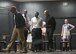 U.S. Air Force Airmen assigned to the 97th Air Mobility Wing perform on stage during an observance luncheon to celebrate Dr. Martin Luther King Jr., Jan. 27, 2017, at Altus Air Force Base, Oklahoma. The luncheon showcased Airmen performing skits reenacting events from peaceful Civil Rights protests. (U.S. Air Force photo by Airman Jackson N. Haddon/ Released)