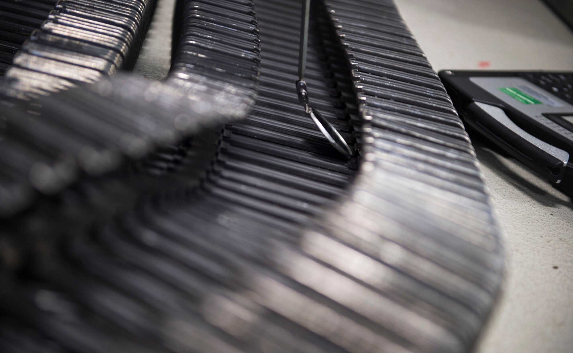 An ammunition loading system is inspected at Hurlburt Field, Fla., Jan. 25, 2017. Ammunition loading systems are inspected every 30 days to ensure the system is aligned. (U.S. Air Force photo by Senior Krystal M. Garrett)
