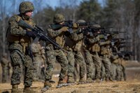 U.S. Marine Corps Lance Cpl. Samuel Minear, Headquarters and Service Company, Marine Barracks Washington, D.C., fires an M16A4 service rifle during a Combat Marksmanship Program range at Marine Corps Base Quantico, Va., Jan. 26, 2017. Marines with H&amp;S Co.  execute training  evolutions to simulate close-range, fire and maneuver combat operations. 