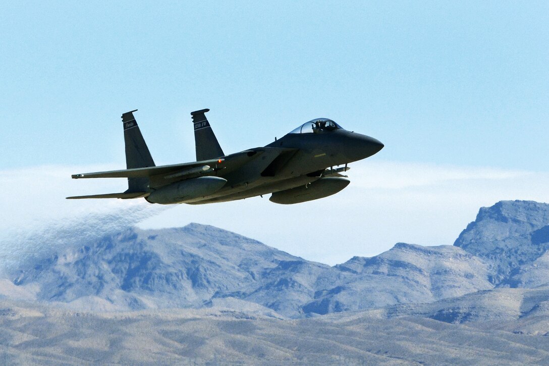 An F-15 Eagle aircraft takes off from the runway on a sortie during Red Flag 17-1 at Nellis Air Force Base, Nev., Jan. 21, 2017. Air National Guard photo by Master Sgt. William J. Buchanan