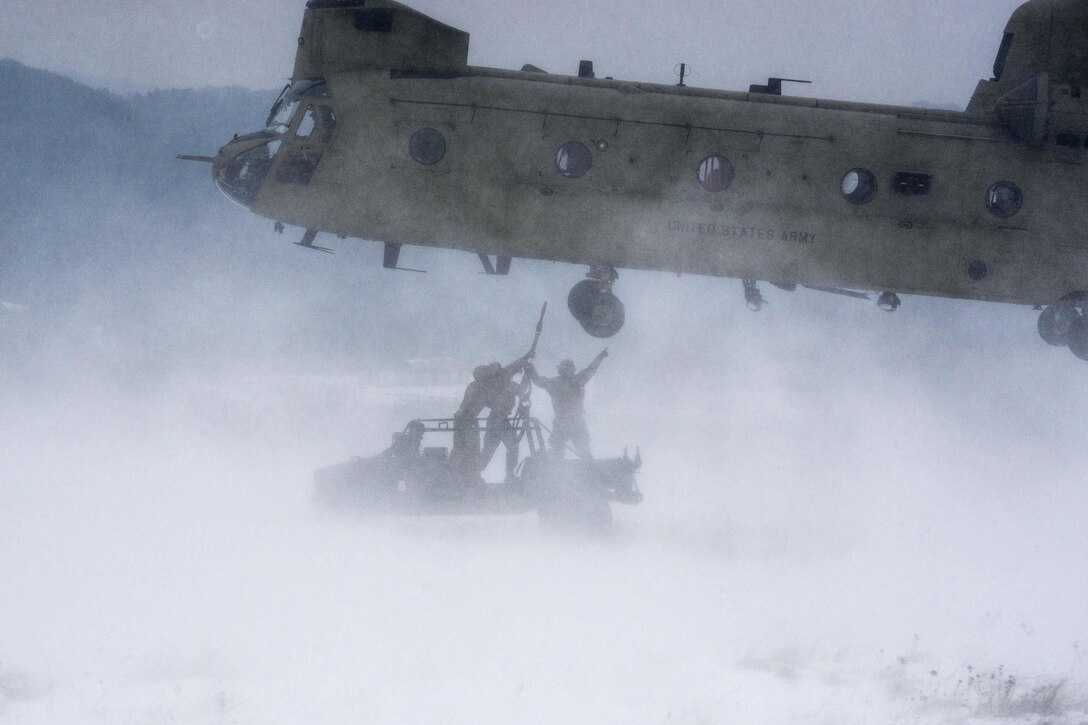 Soldiers conduct slingload training at the Baumholder Military Training Area in Baumholder, Germany, Jan. 26, 2017. The soldiers are assigned to assigned to the 8th Medical Company. Soldiers assigned to Company B, 1st Battalion, 214th Aviation Regiment provided helicopter support. Army photo by Erich Backes