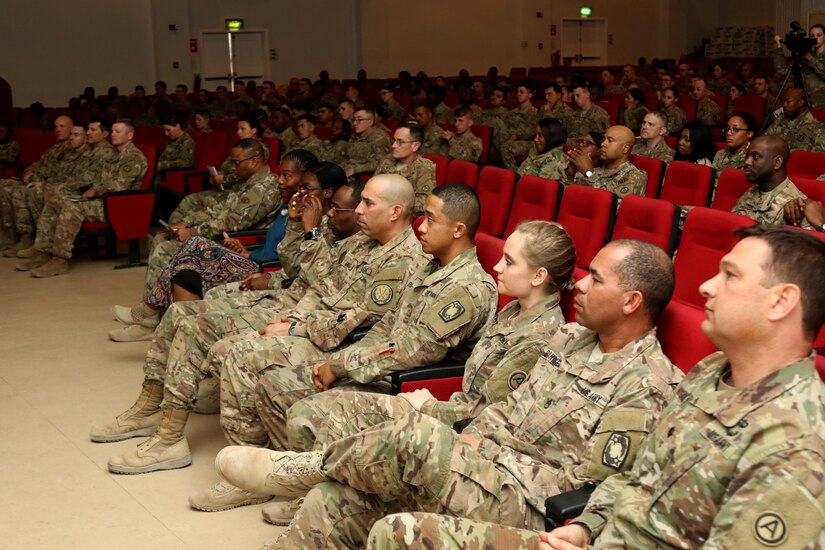 Lt. Col. Martin Kendrick (right) receives an award for being the guest speaker at the Dr. Martin Luther King Jr. observance Jan. 12, 2016. Kendrick, the Area Support Group-Kuwait command chaplain, highlighted the importance of selfless service in memory of Dr. King.