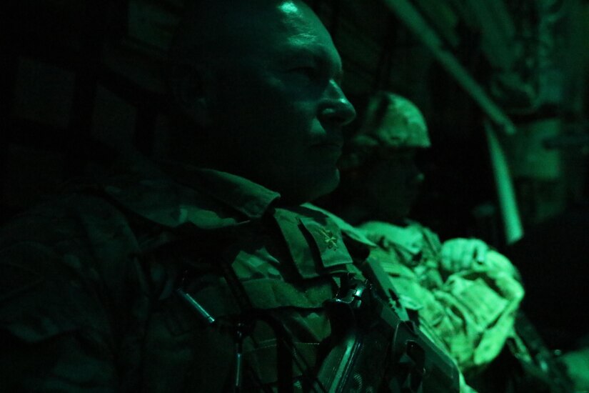Maj. William Rozar and Master Sgt. Jose Torres, working as inspector generals for the 1st Theater Sustainment Command-Operational Command Post, travel on a military C130 airplane to a remove fuel farm in western Iraq to inspect the operations on the ground. The 1st TSC OCP is responsible for overseeing fuel logistics in multiple countries throughout Southwest Asia.(U.S. Army photo by Sgt. Brandon Hubbard, USARCENT Public Affairs/RELEASED)