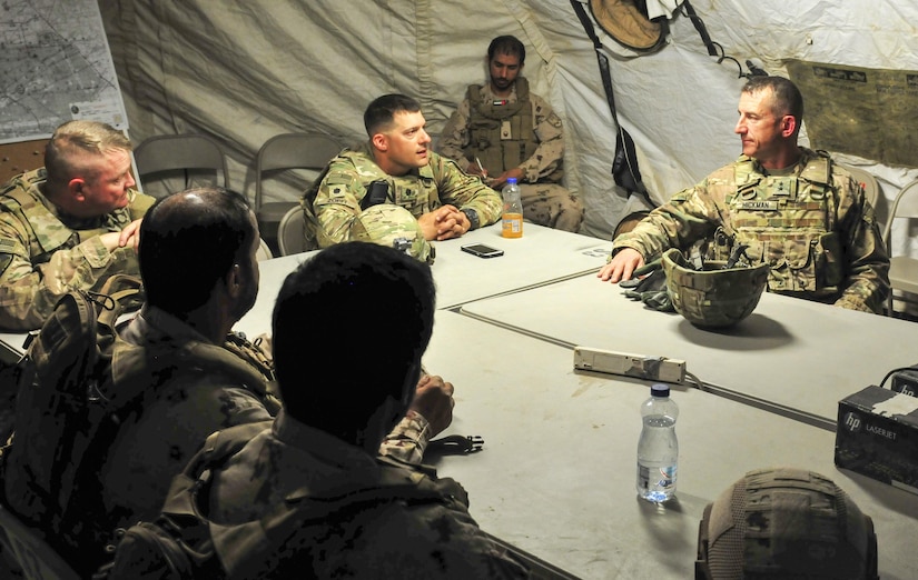 Lt. Col. Michael Zopfi, commander of the 2nd Squadron, 13th Cavalry Regiment, briefs Maj. Gen. William B. Hickman, the U.S. Army Central deputy commanding general of operations, about ongoing training during a joint military exercise at Udairi Range, Kuwait Sept. 26, 2016. (U.S. Army Photo by Sgt. Aaron Ellerman)