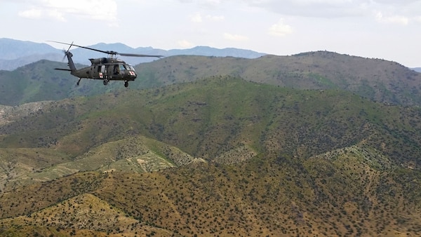 KHOST PROVINCE, Afghanistan - Pilots and crew of a UH-60 Blackhawk helicopter flying a routine training mission over Khost Province, Afghanistan.  The team are members of  Task Force Gunfighters, Charlie Company, 2nd General Support Aviation Battalion, 1st Aviation Regiment,, 1st Infantry Division Combat Aviation Brigade who are deployed providing air medical evacuation support to Chapman Theater Hospital.   (Photo courtesy U.S. Army Capt. Cody Sneed, 2-1 GSAB)