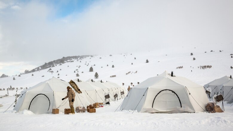 Marines with 2nd Battalion, 2nd Marine Regiment, inhabit Artic Tents at a tent city located in Grouse Meadows training area during Mountain Training Exercise 1-17 in the vicinity of the Marine Corps Mountain Warfare Training Center Bridgeport, Calif., Jan, 18, 2016. MCMWTC is one of the Marine Corps’ most secluded posts, comprised of approximately 46,000 acres of terrain with elevations ranging from 5,000 to 11,000 feet. During this iteration of MTX, the inclusion of the Artic Tent, designed to house up to 15 personnel, enabled the “Warlords” to be truly immersed in the frigid landscape throughout the full duration of the training.