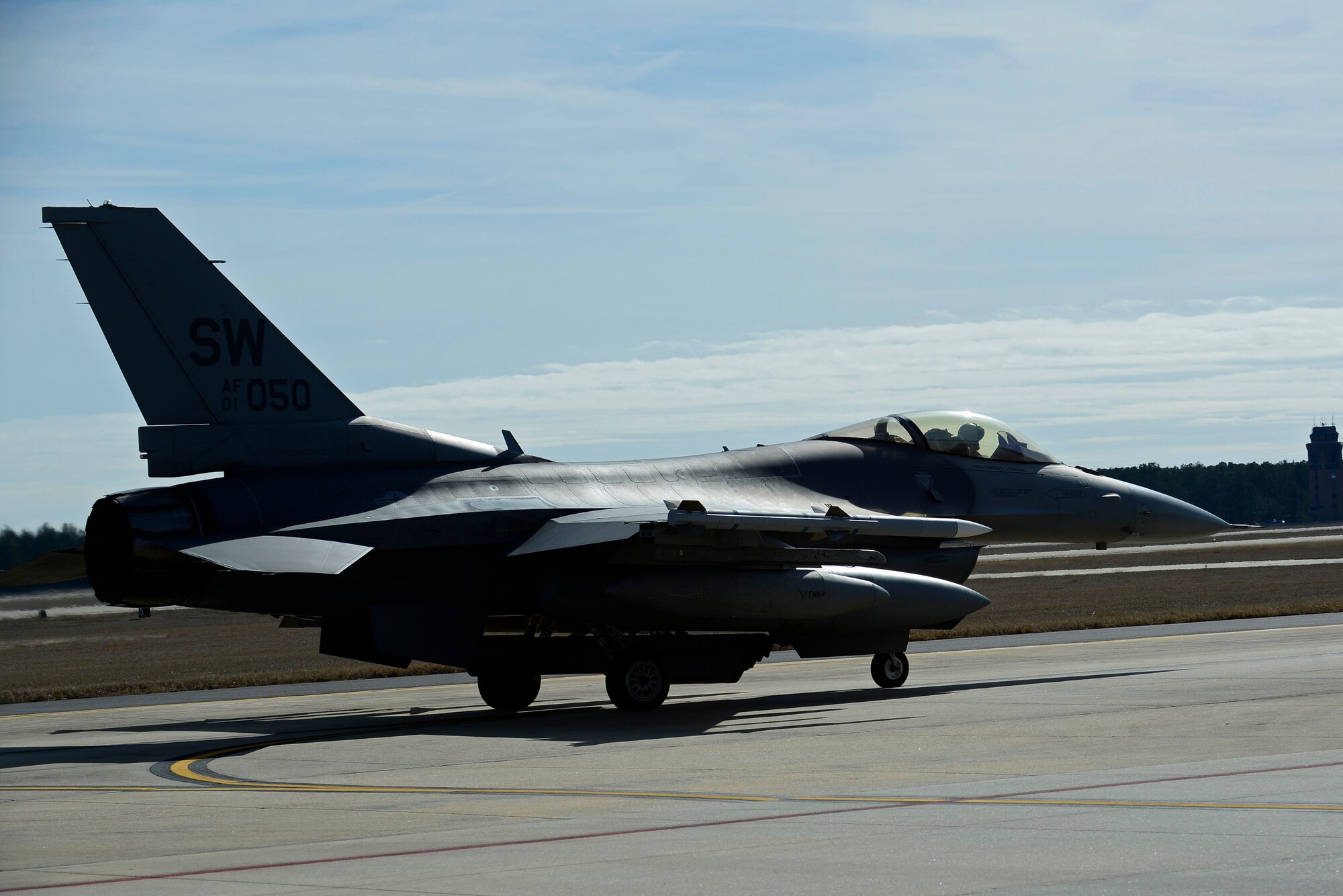 An F-16CM Fighting Falcon prepares for takeoff from Shaw Air Force Base, S.C., Jan. 19, 2017 to Red Flag 17-1 at Nellis AFB, Nev. Red Flag is an exercise that occurs about four times a year and allows multiple aircraft to participate in a realistic training environment. (U.S. Air Force photo by Airman 1st Class BrieAnna Stillman) 

