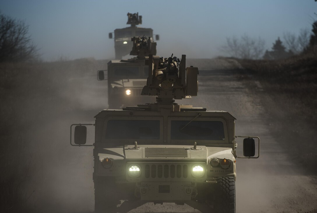 Common Remotely Operated Weapon Stations (CROWS) are mounted on top of a convoy of High Mobility Multipurpose Wheeled Vehicles during a fielding to U.S. Army Reserve units at Fort Chaffee, Arkansas, Jan. 27. The CROWS is a remote-controlled system compatible with four major crew-serve weapons, and it was developed to keep gunners safe within the vehicle while engaging enemy targets. (U.S. Army Reserve photo by Master Sgt. Michel Sauret)