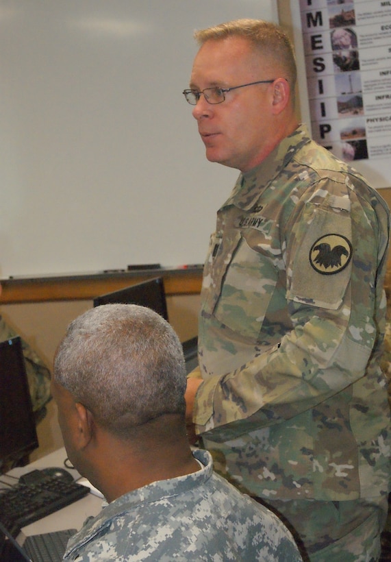 Capt. Tanny Retz discusses the U.S. Army Reserve Command's role in Quality Assurance Officer training at the 80th Training Command's first QAO course held at Grand Prairie, Texas, Jan. 24, 2017.