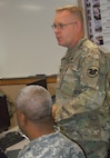 Capt. Tanny Retz discusses the U.S. Army Reserve Command's role in Quality Assurance Officer training at the 80th Training Command's first QAO course held at Grand Prairie, Texas, Jan. 24, 2017.