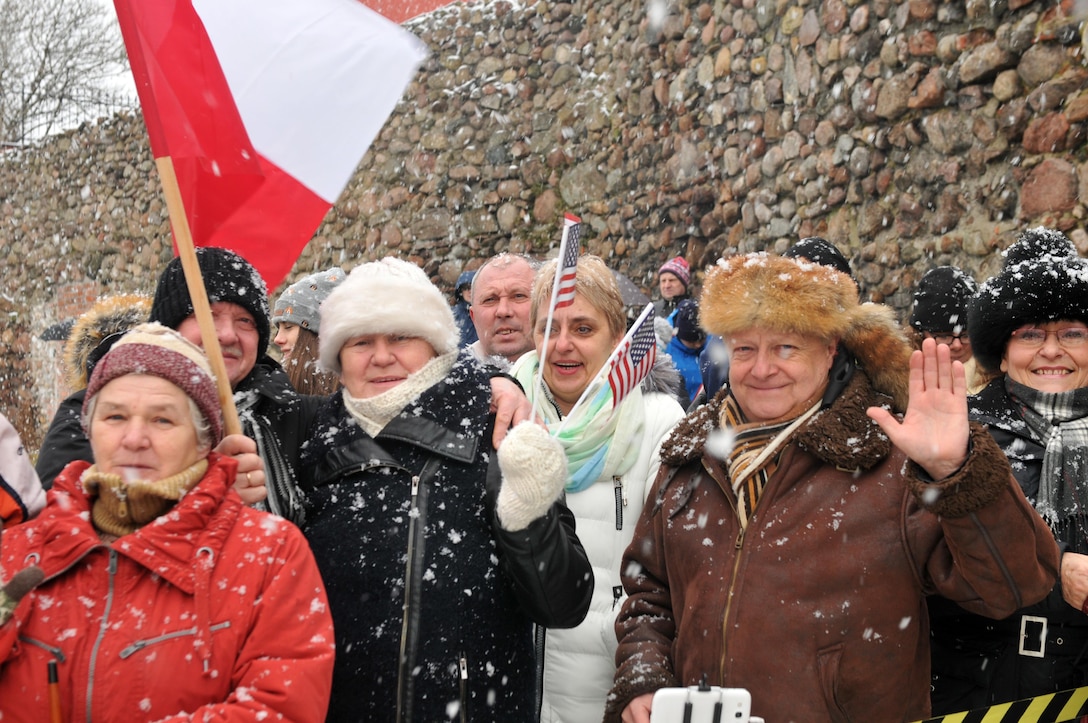 Residents of Zagan, Poland, welcome American soldiers to their country  during a ceremony at Gen. Stanislaw Macek Park, Jan. 14, 2017. The celebration was an opportunity for the Polish people to welcome soldiers from the 3rd Armored Brigade Combat Team, 4th Infantry Division. Army photo by Staff Sgt. Elizabeth Tarr