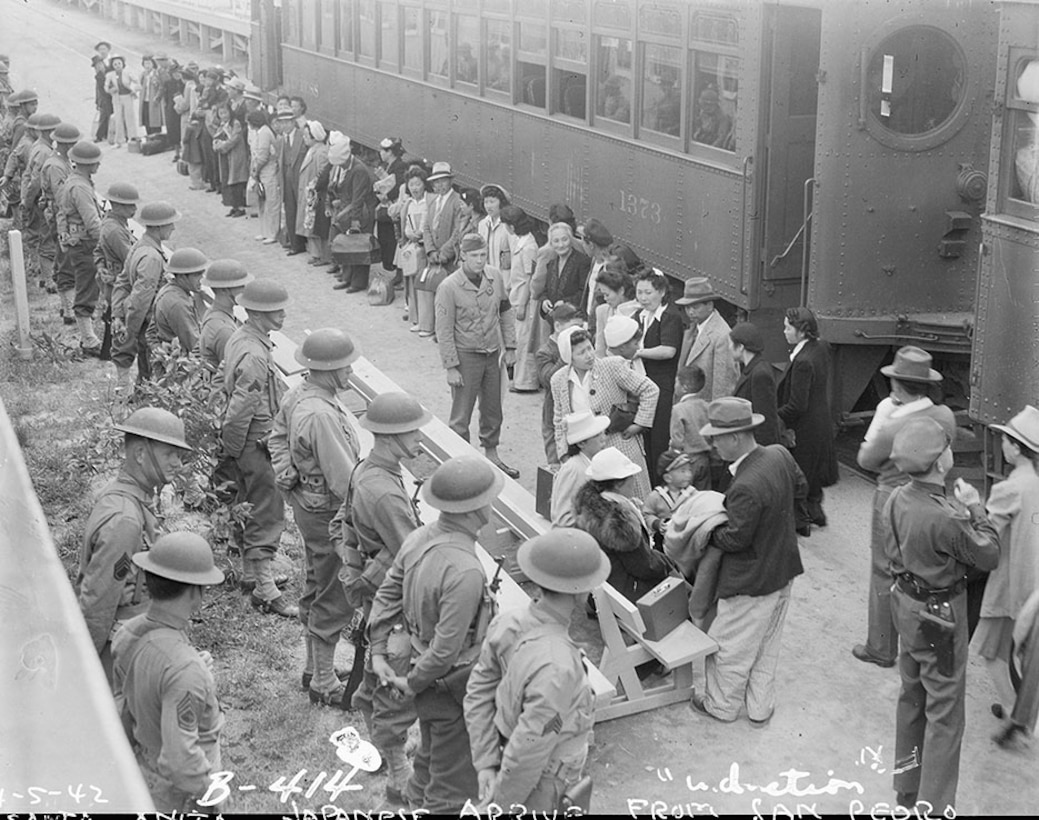 Persons of Japanese ancestry arrive at Santa Anita Assembly center from San Pedro, California, April 5, 1942, Arcadia, California.
