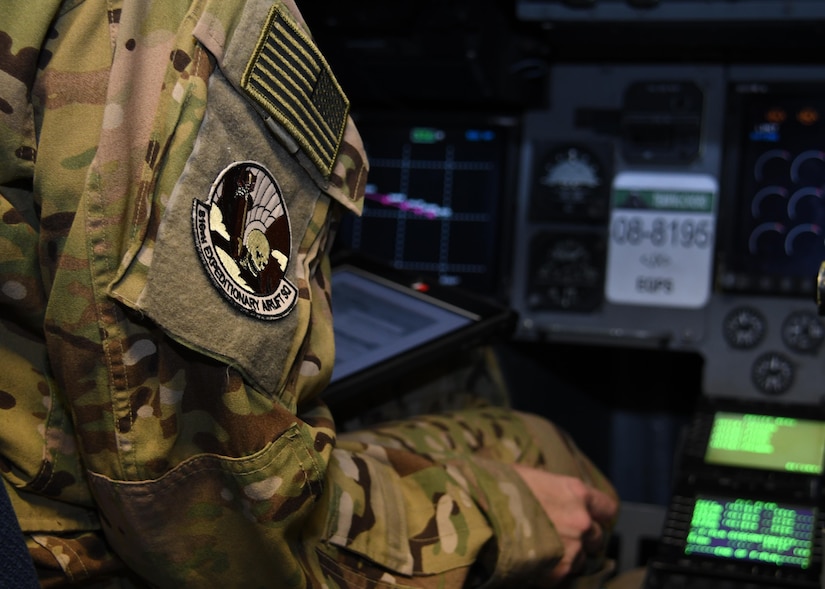 U.S. Air Force Capt. Brittany Bean, a pilot with the 816th Expeditionary Airlift Squadron, goes through preflight checks before taking off at Al Udeid Air Base, Qatar, Dec. 23, 2016. Bean pilots C-17 Globemaster III aircraft, which have the ability to rapidly project and sustain an effective combat force close to a potential combat area. In 2016, the squadron flew more than 2,400 missions, moving nearly 102,000 tons of cargo and almost 120,000 passengers. (U.S. Air Force photo by Senior Airman Miles Wilson)