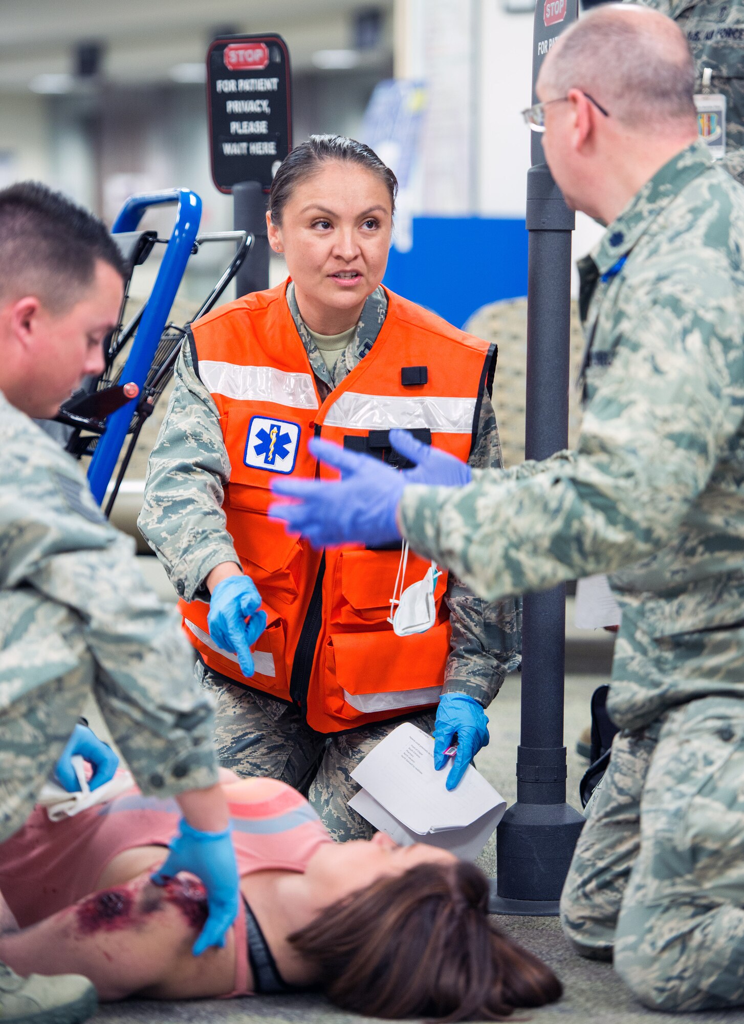 Service members from David Grant USAF Medical Center participate in an active shooter exercise at Travis Air Force Base, Calif., Jan. 26, 2017. The exercise evaluated the medical staff’s lock down response and patient care procedures. (U.S. Air Force photo/Louis Briscese)