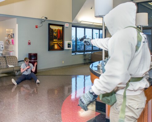 Service members from David Grant USAF Medical Center participate in an active shooter exercise at Travis Air Force Base, Calif., Jan. 26, 2017. The exercise evaluated the medical staff’s lock down response and patient care procedures. (U.S. Air Force photo/Louis Briscese)