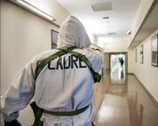 Service members from David Grant USAF Medical Center participate in an active shooter exercise at Travis Air Force Base, Calif., Jan. 26, 2017. The exercise evaluated the medical staff’s lock down response and patient care procedures. (U.S. Air Force photo/Louis Briscese)