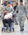 Service members from David Grant USAF Medical Center participate in an active shooter exercise at Travis Air Force Base, Calif., Jan. 26, 2017. The exercise evaluated the medical staff’s lock down response and patient care procedures. (U.S. Air Force photo/Louis Briscese)