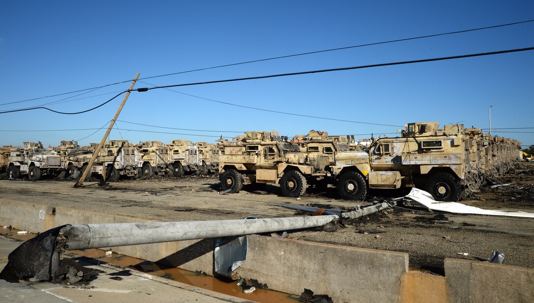 Many military vehicles aboard Marine Corps Logistics Base Albany were damaged by a EF-3 tornado as it swept through the installation carving a path of destruction leaving the landscape strewn with broken trees, downed power lines and damaged structures, Jan. 22.