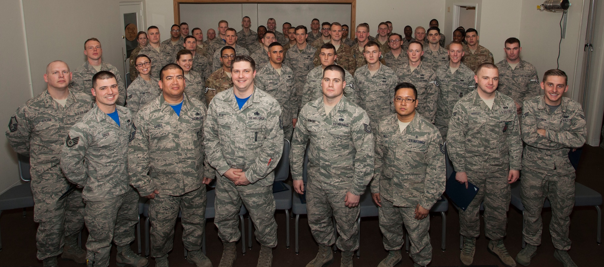 Enlisted Airmen who promoted in December and January pose for a group photo, Jan. 27, 2017, on F.E. Warren Air Force Base, Wyo. Each month the Mighty Ninety hosts a ceremony to recognize the promotees from the base. (U.S. Air Force photo by Lan Kim)