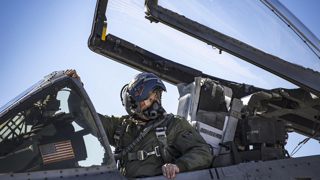 Air Force Capt. Sean Griffin looks back toward the engines of his A-10C Thunderbolt II before a Green Flag-West 17-03 sortie at Nellis Air Force Base, Nev., Jan. 25, 2017. Griffin is a pilot assigned to the 74th Fighter Squadron. Air Force photo by Staff Sgt. Ryan Callaghan
