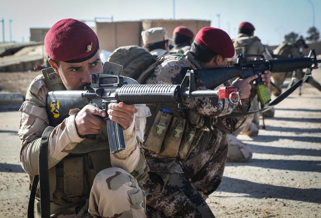 Iraqi soldiers from 7th Iraqi Army Division provide security during the platoon assault movement portion of their culminating training at Al Asad Air Base, Iraq, Jan. 15, 2017. Training at building partner capacity sites is an integral part of Combined Joint Task Force – Operation Inherent Resolve’s effort to train Iraqi security forces personnel. CJTF-OIR is the global Coalition to defeat ISIL in Iraq and Syria. (U.S. Army photo by Sgt. Lisa Soy)