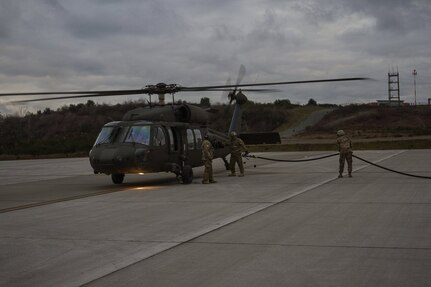 U.S. Army Soldiers assigned to 16th Combat Aviation Brigade, 7th Infantry Division refuel a UH-60 Black Hawk helicopter during training at Joint Base Lewis-McChord, Wash., Jan. 26, 2017. The Soldiers were supported by U.S. Army Reserve Soldiers, who provided Forward Area Refueling Equipment in a CH-47 Chinook helicopter to prepare the 16th CAB Soldiers for their upcoming mission in Afghanistan. 
