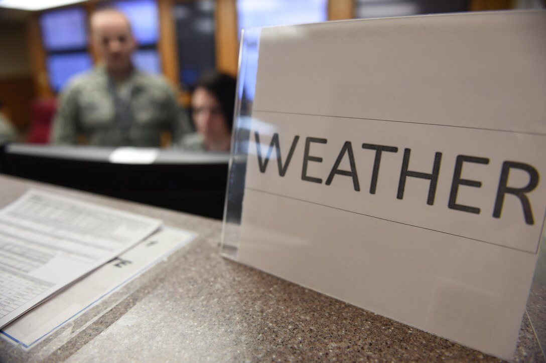 Red Flag 17-1 weather forecasters conduct a shift change at Nellis Air Force Base, Nev., Jan. 24, 2017. The forecast team works two separate shifts during the U.S. Air Force’s premiere air-to-air combat training exercise ensuring accurate and timely weather inputs are incorporated into day and night mission planning. (U.S. Air Force photo by Staff Sgt. Natasha Stannard)