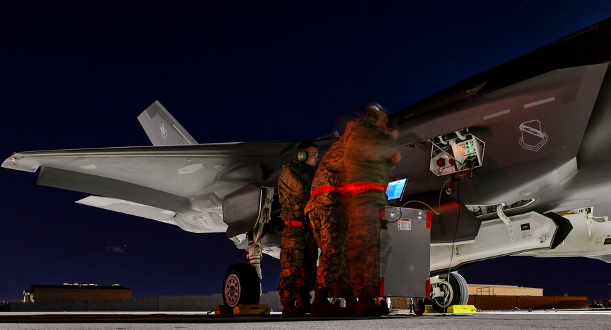 Maintainers from the 419th and 388th Fighter Wings at Hill Air Force Base, Utah, conduct preflight checks on an F-35A Lightning II during Red Flag 17-1 at Nellis AFB, Nev., Jan. 24, 2017. The F-35A will be participating in Red Flag 17-1, making it the first iteration to incorporate the fifth-generation fighter. (U.S. Air Force photo/Airman 1st Class Nathan Byrnes)