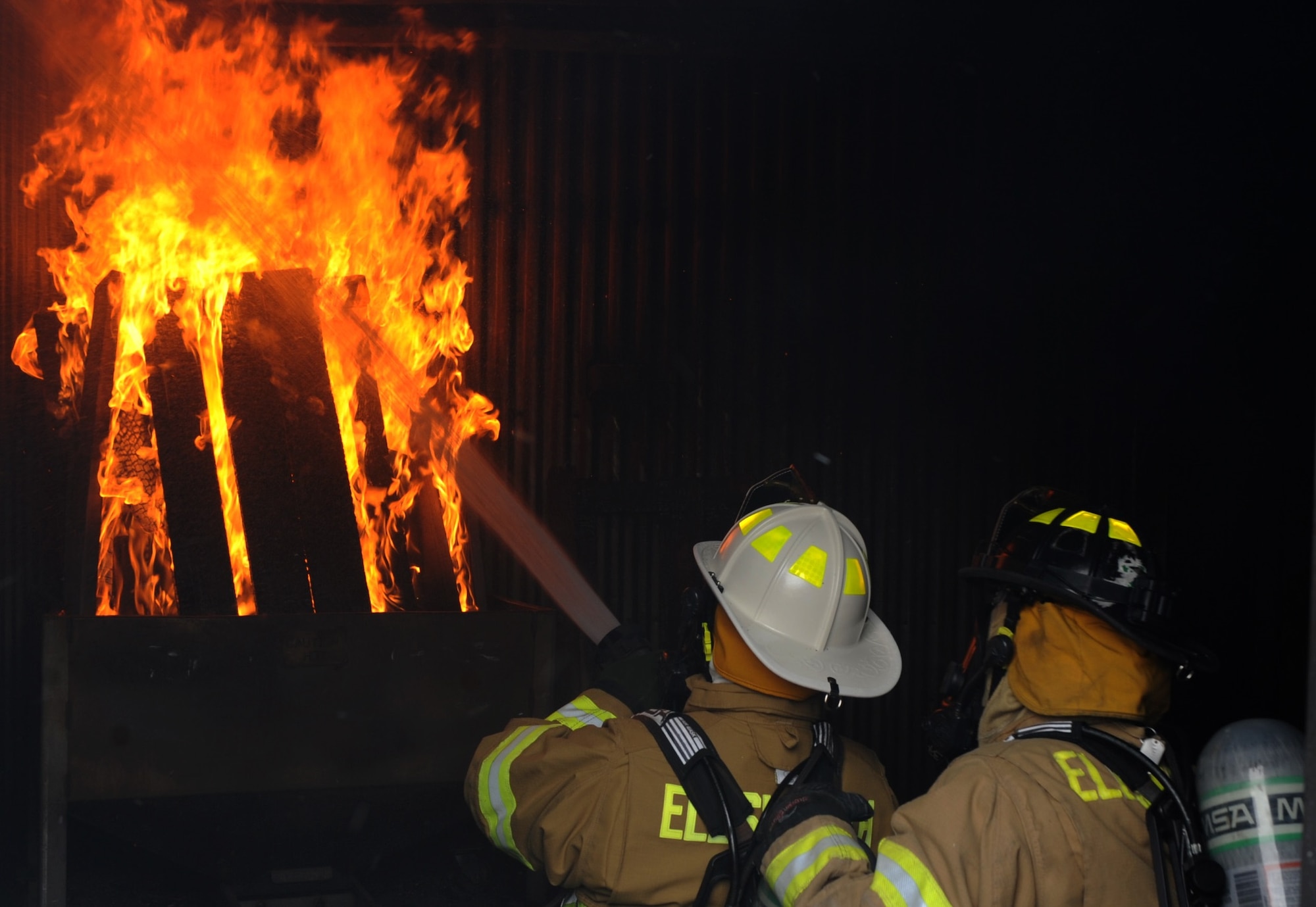 Members of the 28th Civil Engineer Squadron Fire and Emergency Services conduct training at Ellsworth Air Force Base, S.D., on March 29, 2016. Cooking is the biggest cause of home fires, which is way kitchen fire safety is so important. (U.S. Air Force photo by Airman 1st Class Denise Jenson)