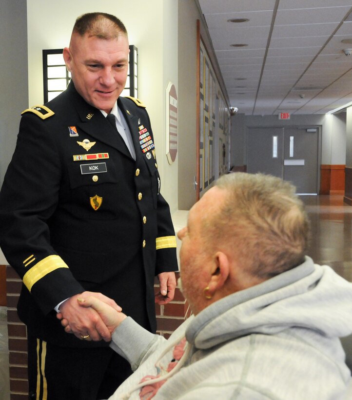 Maj. Gen. Troy D. Kok, commanding general of the U.S. Army Reserve’s 99th Regional Support Command headquartered at Joint Base McGuire-Dix-Lakehurst, New Jersey, meets with Gerald B. Griggs, an Air Force staff sergeant who served in Vietnam, during a Jan. 28 visit to the New Jersey Department of Military and Veterans Affairs’ Veterans Memorial Home in Vineland, New Jersey. The purpose of Kok’s visit was to thank veterans for their service and encourage young Soldiers to spend time with veterans in their local area.
