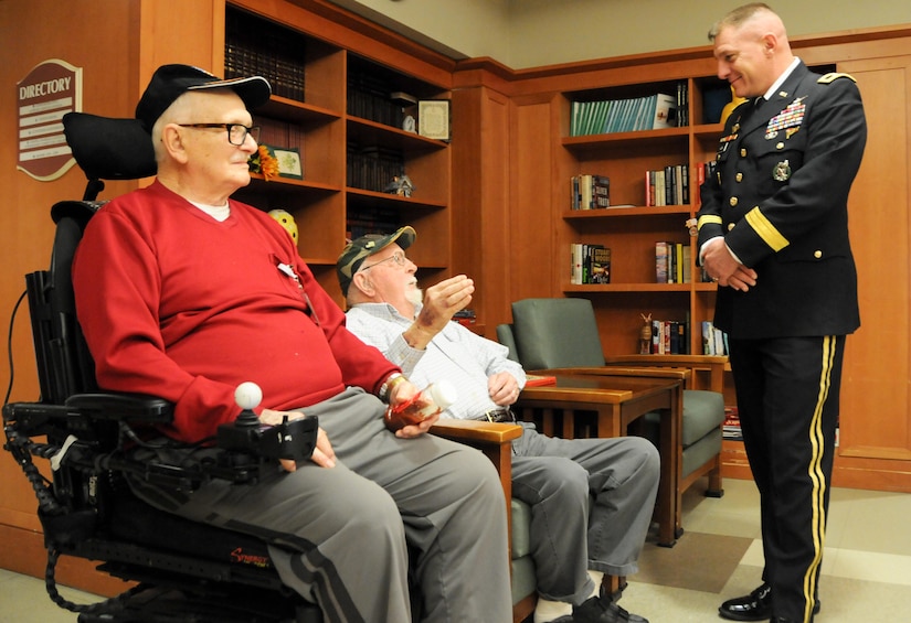 Maj. Gen. Troy D. Kok, commanding general of the U.S. Army Reserve’s 99th Regional Support Command headquartered at Joint Base McGuire-Dix-Lakehurst, New Jersey, meets with (from left) George A. Teale, an Army private who served in World War II, and Larry H. Stange, a Marine sergeant who served in Korea, during a Jan. 28 visit to the New Jersey Department of Military and Veterans Affairs’ Veterans Memorial Home in Vineland, New Jersey. The purpose of Kok’s visit was to thank veterans for their service and encourage young Soldiers to spend time with veterans in their local area.
