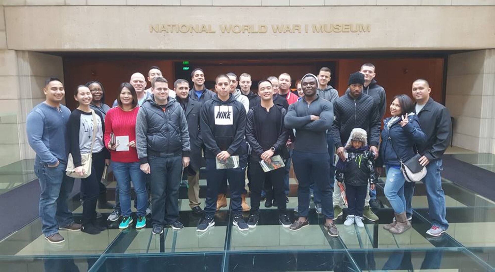 Members of the 509th Logistics Readiness Squadron and their family members visit the National World War I Museum at Kansas City, Mo., Dec. 16, 2016. The tour was relevant to the individual protective equipment (IPE) specialists because it educated the Airmen on how the protective gear has evolved and modernized to what they work with every day at IPE. (Courtest photo)