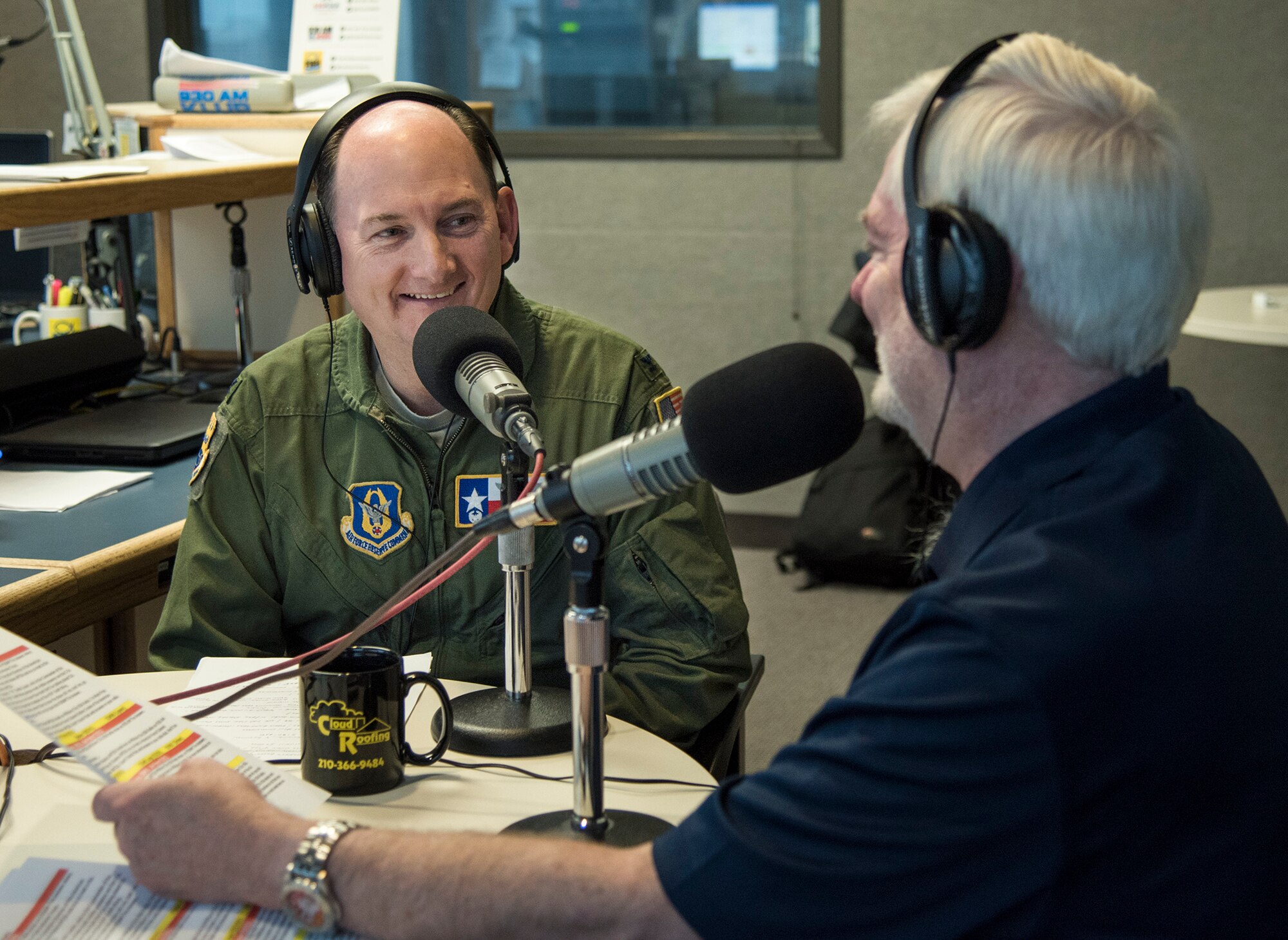 Col. Thomas K. Smith, Jr., 433rd Airlift Wing commander, responds to an interview question by Mark Frye on the Military USA Radio show Jan. 28, 2016 at Salem Communications San Antonio, Texas. The show runs every Saturday from 8 to 9 a.m. and seeks to inform and educate listeners about the importance of the more than 200 military missions in the Alamo city.   (U.S. Air Force photo by Benjamin Faske)