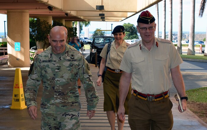 Maj. Gen. Martin CM Bricknell (right), United Kingdom, Director of Medical Policy, Operations and Capability, Headquarters Joint Forces Command visits with Acting Tripler Army Medical Center (TAMC) Commander, Col. Duane R. Hennion (Left) while touring Tripler, Jan. 25, 2017. The purpose of Bricknell's visit was to gain a better understanding of the U.S. Army's approach to health engagements and how healthcare is delivered through various echelons throughout the Pacific area of responsibility. During his visit, Bricknell was given a tour of TAMC departments with an emphasis on clinical lessons learned from combat casualty care. Bricknell's visit included a command briefing about Global Health Engagements with TAMC executive staff, a visit to TAMC's Surgical Care areas, Intensive Care Unit, and the TAMC Simulation Center. 