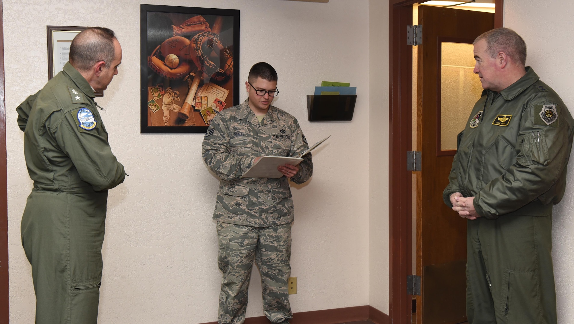 Staff Sgt. Robert Sealey, 321st Missile Squadron facility manager, briefs U.S. Navy Vice Adm. Charles “Chas” A. Richard, U.S. Strategic Command deputy commander, and Maj. Gen. Richard J. Evans III, USSTRATCOM mobilization assistant, before escorting them at the missile alert facility in the 90th Missile Wing missile complex, Jan. 26, 2017. Sealey provided a tour of the MAF as part of Richard’s familiarization with the ICBM leg of the nation’s nuclear triad. (U.S. Air Force photo by Airman 1st Class Breanna Carter)