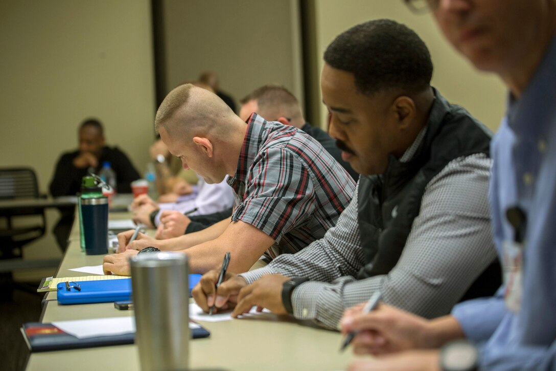 Senior leaders from across Marine Forces Reserve participate in a disclosure exercise during the Senior Leadership Workshop at Marine Corps Support Facility New Orleans, Jan. 23-26, 2017. The exercise has the Marines and Sailors share various aspects about themselves and their life, it demonstrates the diversity found among the Marines and Sailors participating. The workshop aims to emphasize the importance of open communication and equal opportunity, and to demonstrate their effects on unit cohesion, mission accomplishment and mission readiness.  (U.S. Marine Corps photo by Sgt. Sara Graham) 