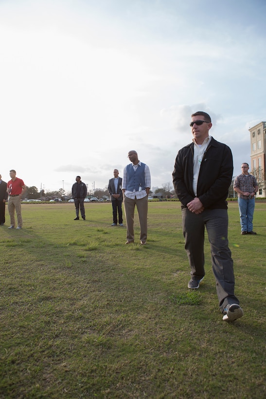 Senior leaders from across Marine Forces Reserve participate in “Power Shuffle” during the Senior Leadership Workshop at Marine Corps Support Facility New Orleans, Jan. 23-26, 2017. The exercise shows how societies segregate different categories of people along the lines of power. The Marines and Sailors took steps forward or back after starting on the same line to demonstrate how differences in gender, racial heritage, sexual orientation, religion, age, and more can allow some groups to be given more power than others. Throughout the course the leaders discussed how these issues can affect unit cohesion, mission accomplishment and mission readiness.  (U.S. Marine Corps photo by Sgt. Sara Graham)