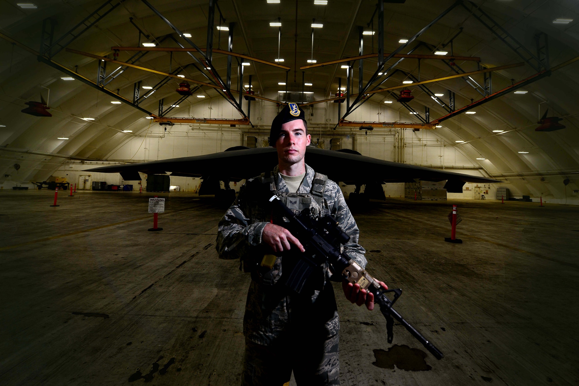 U.S. Air Force Senior Airman Andrew Conlon, a security forces member assigned to the 2nd Security Forces Squadron from Barksdale Air Force Base, La., stands guards at an entry control point Jan. 24, 2017 at Andersen Air Force Base, Guam. Close to 200 Airmen from Whiteman Air Force Base, Mo., and Barksdale Air Force Base, La., deployed to Andersen AFB, in support of U.S. Strategic Command Bomber and Deterrence missions. USSTRATCOM bomber missions familiarize aircrew with airbases and operations in different Geographic Combatant Commands. USSTRATCOM forces are on watch 24 hours a day, seven days a week to deter and detect strategic attack against the United States and our allies. (U.S. Air Force photo by Tech Sgt. Andy M. Kin)