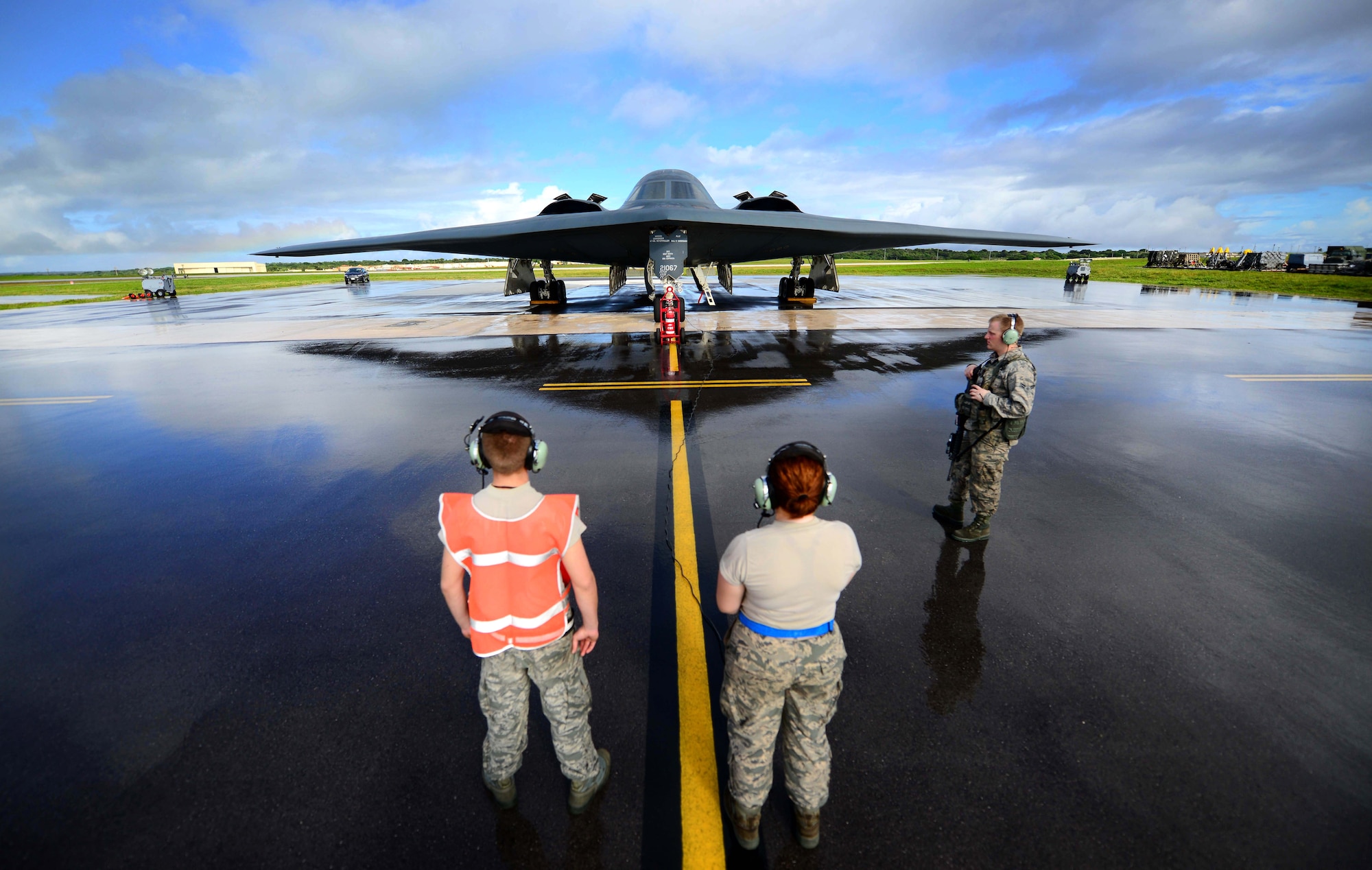 U.S. Air Force maintenance technicians assigned to the 509th Aircraft Maintenance Squadron, Whiteman Air Force Base, Mo., communicate with a B-2 Spirit pilot during pre-flight checks prior to a local training mission at Anderson Air Force Base, Guam Jan. 12, 2017. Close to 200 Airmen from Whiteman Air Force Base, Mo., and Barksdale Air Force Base, La., deployed to Andersen AFB, in support of U.S. Strategic Command Bomber and Deterrence missions. USSTRATCOM bomber missions familiarize aircrew with airbases and operations in different Geographic Combatant Commands. (U.S. Air Force photo by Tech Sgt. Andy M. Kin)