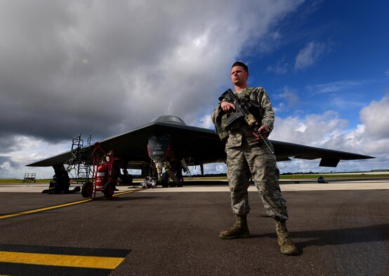 U.S. Air Force Senior Airman Taylor Lang, a 509th Security Forces Squadron security response member, stands guard at the entry control point at Andersen Air Force Base, Guam, Jan. 16, 2017. U.S. Strategic Command forces are on watch 24 hours a day, seven days a week to deter and detect strategic attack against the United States and our allies. (U.S. Air Force photo by Airman 1st Class Jazmin Smith)