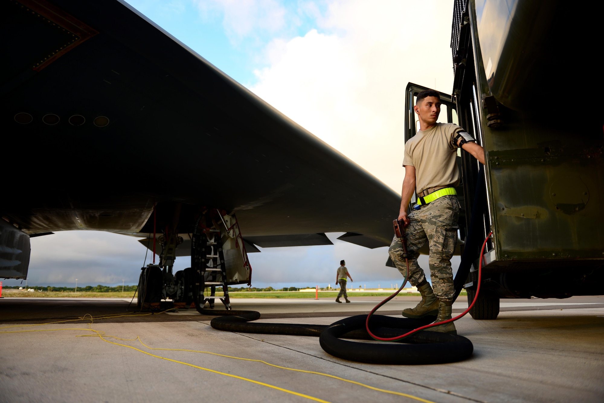 U.S. Air Force Airman 1st Class Armando Torres, a fuels distribution technician assigned to the 509th Logistics Readiness Squadron, monitors the control panel to ensure he maintains proper nozzle pressure and revolutions per minute while refueling a B-2 Spirit at Andersen Air Force Base, Guam, Jan. 17, 2017. The refueling operations are capable of delivering up to 600 gallons per minute. (U.S. Air Force photo by Airman 1st Class Jazmin Smith)