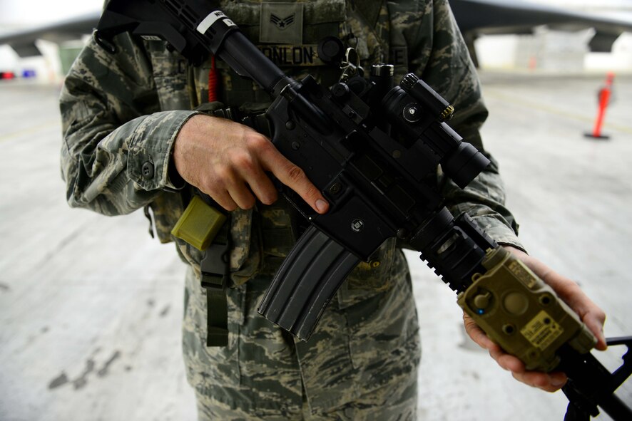 U.S. Air Force Senior Airman Andrew Conlon, a security forces member assigned to the 2nd Security Forces Squadron from Barksdale Air Force Base, La., stands guards at an entry control point Jan. 24, 2017 at Andersen Air Force Base, Guam. Close to 200 Airmen from Whiteman Air Force Base, Mo., and Barksdale Air Force Base, La., deployed to Andersen AFB, in support of U.S. Strategic Command Bomber and Deterrence missions. USSTRATCOM bomber missions familiarize aircrew with airbases and operations in different Geographic Combatant Commands. USSTRATCOM forces are on watch 24 hours a day, seven days a week to deter and detect strategic attack against the United States and our allies. (U.S. Air Force photo by Tech. Sgt. Andy M. Kin)