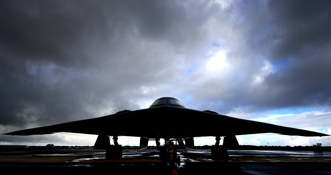 A U.S. Air Force B-2 Spirit aircraft deployed from Whiteman Air Force Base, Mo., sits on the parkway right after a down pour of rain prior to takeoff at Andersen Air Force Base, Guam, Jan. 12, 2017. Close to 200 Airmen and three B-2s deployed from Whiteman Air Force Base, Mo., and Barksdale Air Force Base, La., in support of U.S. Strategic Command Bomber Assurance and Deterrence missions. USSTRATCOM units regularly conduct training with and in support of the Geographic Combatant Commands. USSTRATCOM, through its global strike assets, helps maintain global stability and security while enabling units to become familiar with operations in different regions. (U.S. Air Force photo by Tech. Sgt. Andy M. Kin)